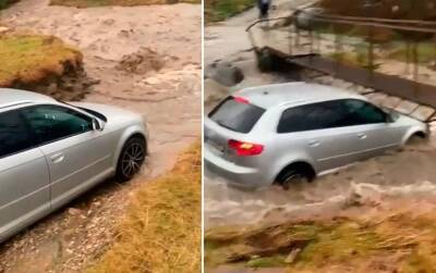 Водитель Audi попытался пересечь реку и попутно снес мост (видео) - autocentre.ua