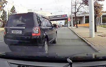 Видеофакт: В Минске водитель Land Rover подрезал авто и сбежал - charter97.org - Белоруссия - Минск