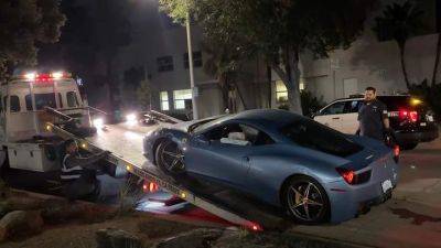 Ferrari 458 за четверть миллиона долларов грузили на эвакуатор, как металолом: видео - auto.24tv.ua