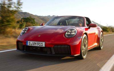 Porsche представила первый гибридный спорткар 911 - autostat.ru